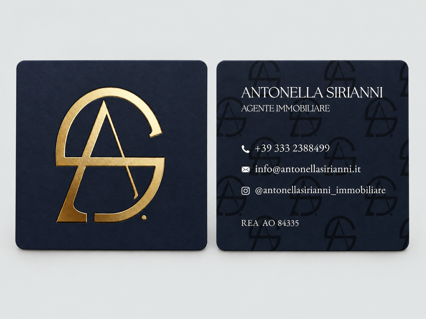 Antonella Sirianni business cards on a grey background